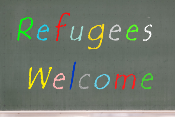 "Refugees Welcome" in rainbow lettering on a black background.
