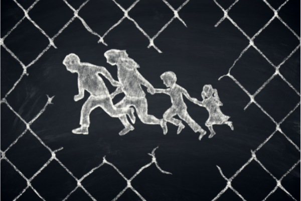 Silhouettes of two adults and two children running, black background with the frame of a wire fence.