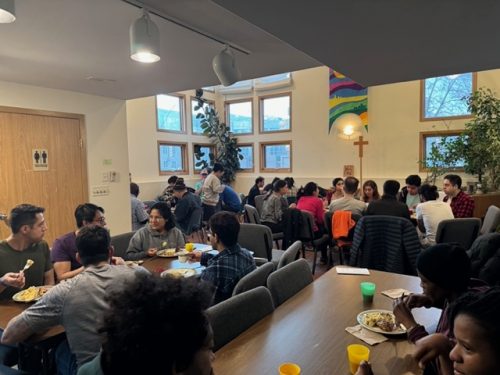 Students sharing dinner at the Lutheran Campus Centre.
